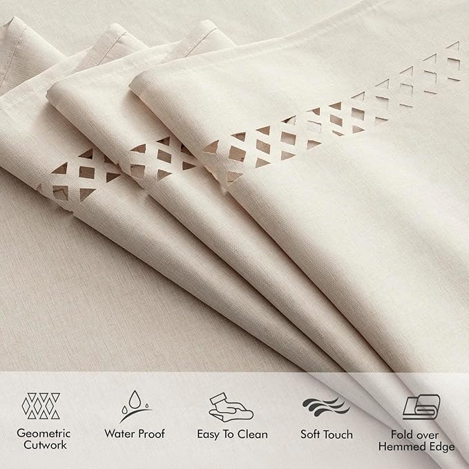 Beige rectangular linen-polyester blend tablecloth with decorative cutwork pattern, waterproof, stain-resistant, and shrink-resistant, measuring 52x70 inches.  Farmhouse style, suitable for dining rooms, weddings, parties, and outdoor picnics.